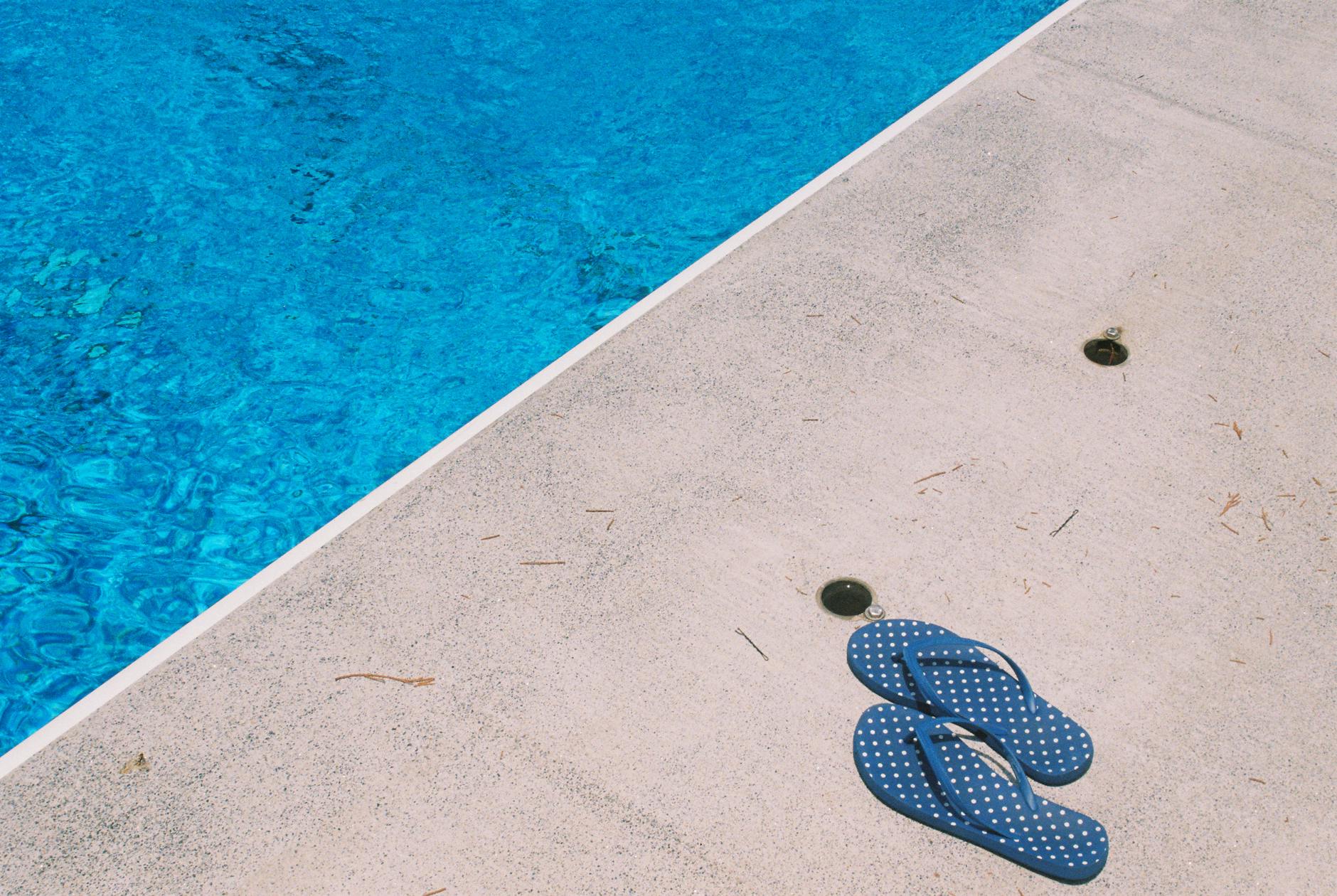 Concrete pool deck installation with slip-resistant finish in NJ