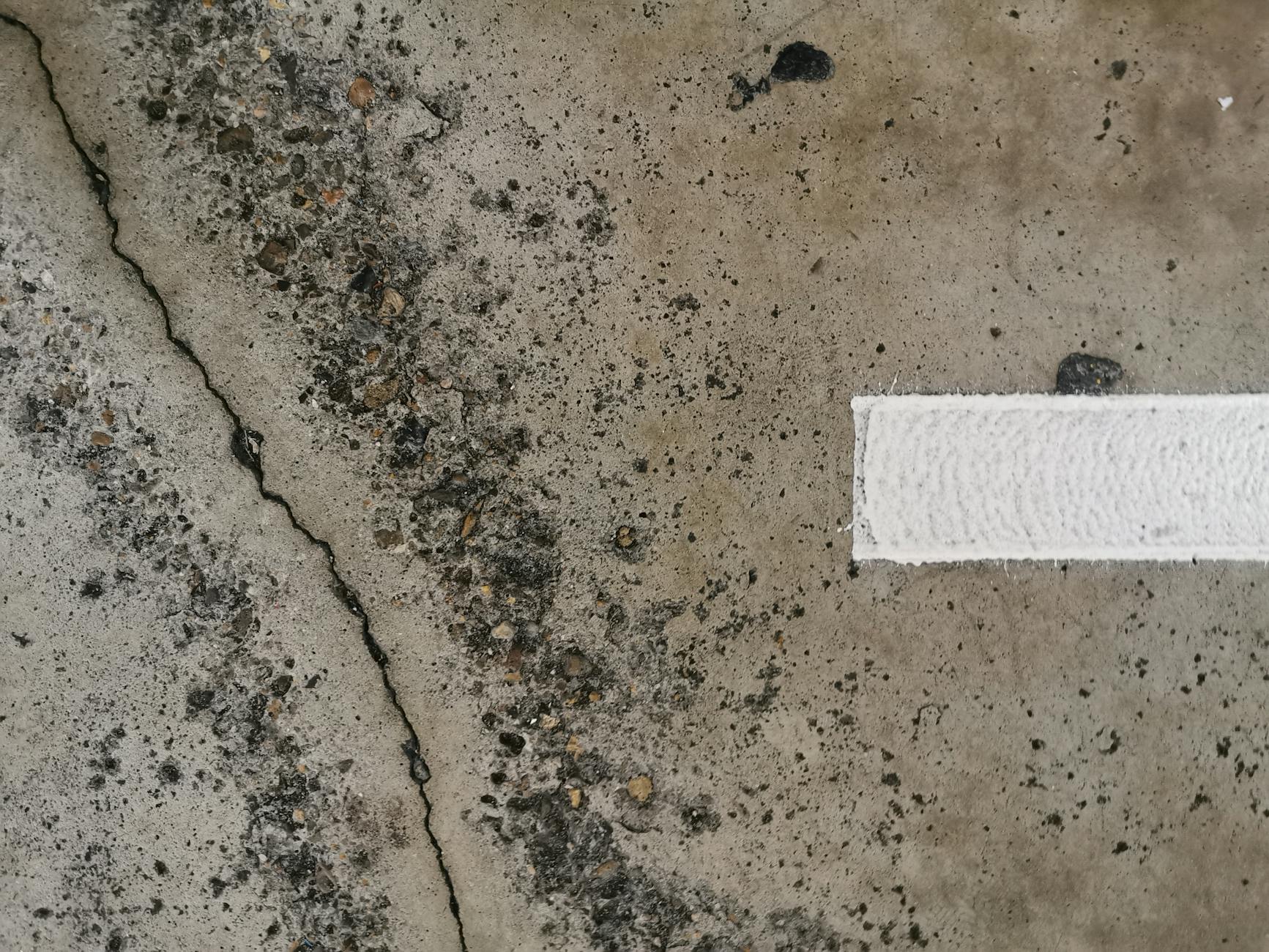 Concrete crack repair on residential driveway in Hudson County